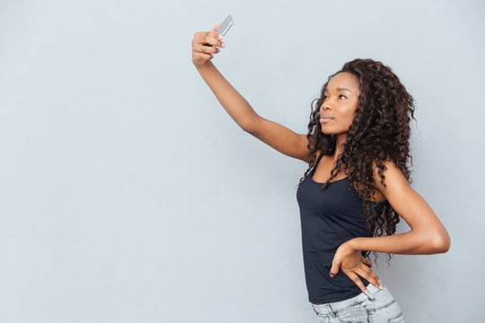 Afro american woman making selfie photo