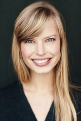 Gorgeous blond woman smiling at camera