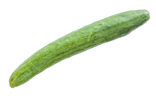Macro Japanese cucumber isolated on white background.