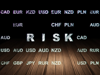 Finance concept: Risk in grunge dark room