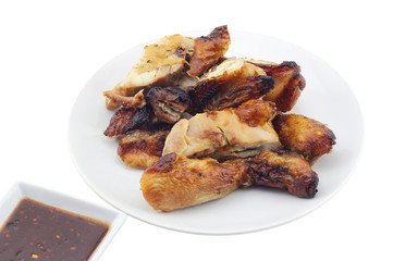 Grilled chicken and sauces in white container isolate on white background.(with clipping path)