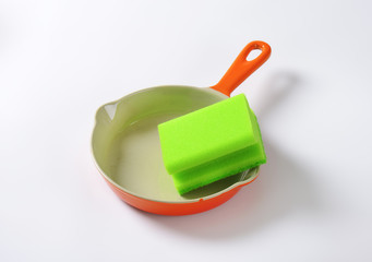 kitchen sponge on ceramic dish