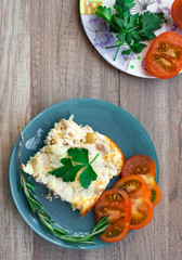 healthy breakfast with chicken omelet and tomato