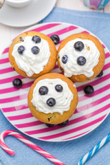 Sweet delicious muffins cream cranberries
