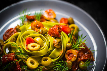 Warm lunch Pasta tomato sauce capers asparagus Magic light