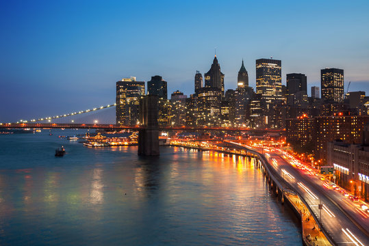 Long exposure of Brooklyn Bridge and downtown Manhattan in New York City