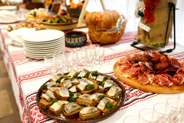  Traditional alcohol  and appetizer on wedding table