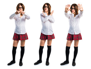 Fototapeta premium Pretty young girl doing NO gesture