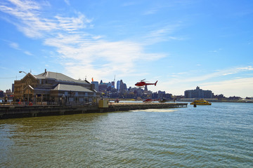 Helicopter landing at helipad in Lower Manhattan New York