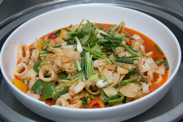 Seafood with Yellow curry sauce, sauteed seafood contains fish,