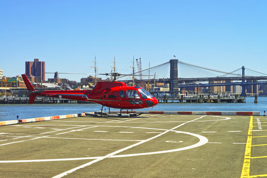 Helicopter taking off from helipad in Lower Manhattan New York