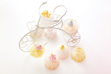 Cake and cupcakes on vintage white bicycle