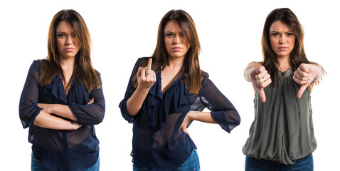 Obraz premium Young girl making horn gesture