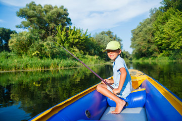 Boy fishing at the river