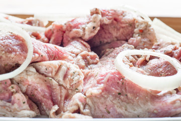 Fresh raw pork fillet steak  meat with sliced onion