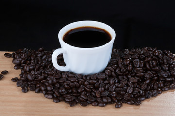 coffeebeans around white cup on wooden #2