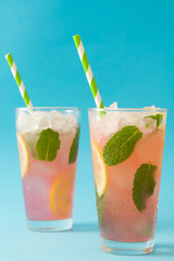Fresh watermelon mojito. Blue background

