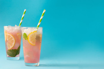 Fresh watermelon mojito. Blue background
