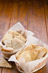 bread on a wooden table in the basket