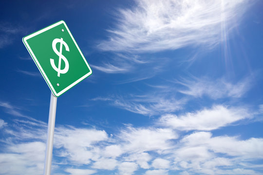 Green Road Sign with Dollar Sign Inside on Blue Sky Background