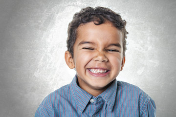 Portrait of a cute african american little boy, isolated on whit
