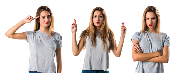 Young girl with her fingers crossing