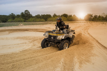 Fototapeta premium Racing ATV is sand. 