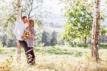 Fototapeta premium Portrait of love couple embracing outdoor in park.