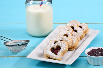 Heart shaped cookie filled with strawberry jam