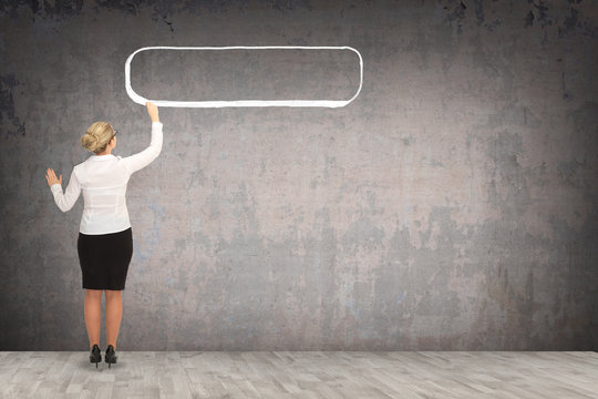 Business woman drawing on the wall. business concept
