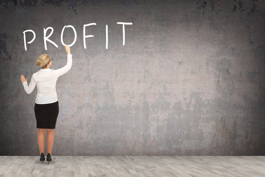 Business woman drawing on the wall. business concept

