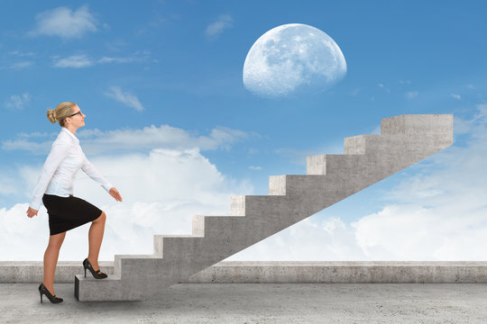 Business person stepping up a staircase. business concept
