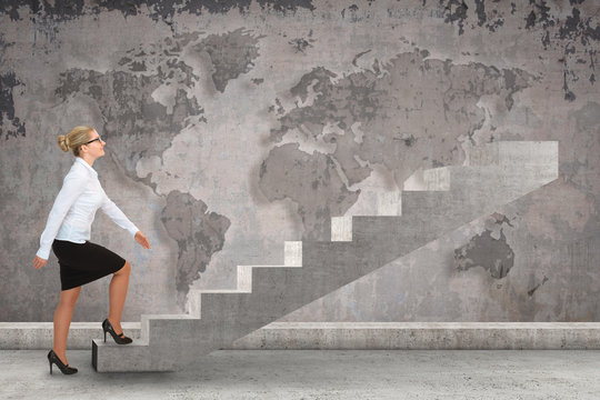 Business person stepping up a staircase. business concept
