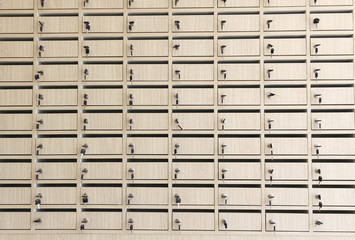 row of metal lockers with keys for safekeeping of valuables