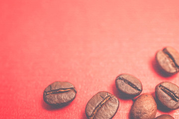coffee beans on vintage color paper background

