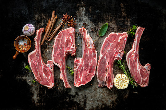 Raw fresh lamb meat on dark background