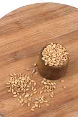 Obraz na płótnie Canvas Bowl full of wheat grains