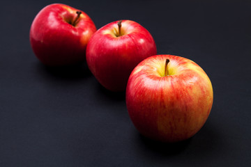 red apple isolated on a black background