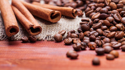 Coffee beans on wood background