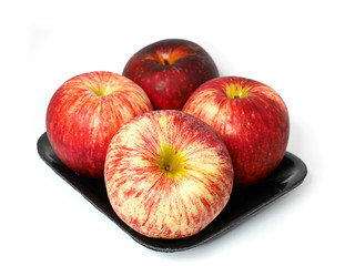 4 red apple in black tray