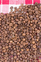 Coffee beans background on the kitchen table cloth