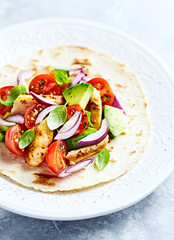 Fajita with grilled Sesame Chicken, fresh Tomatoes and Avocado
