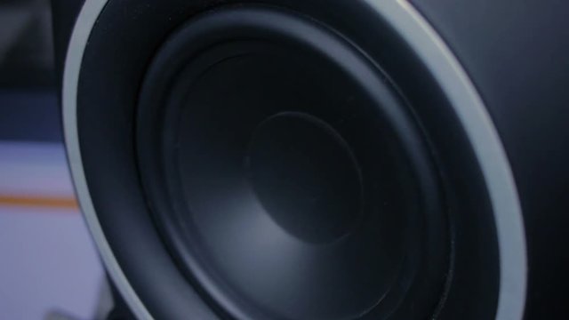 Large black speaker doing a bass test. HD.