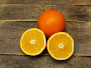 orange fruit in wood background