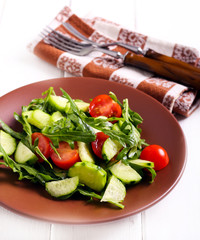 Cucumber, rocket and tomato salad