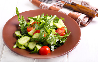 Cucumber, rocket and tomato salad