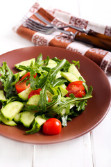 Cucumber, rocket and tomato salad