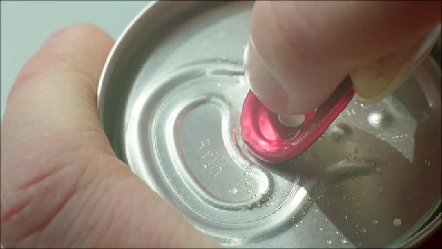 Opening can of soda