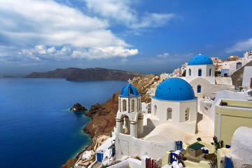 Greece. Cyclades Islands - Santorini (Thira). Oia town with characteristic painted blue cupolas and white walls of houses