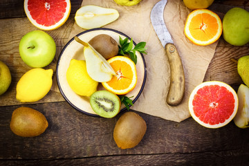 Fototapeta na wymiar Healthy food - fresh organic fruits on table